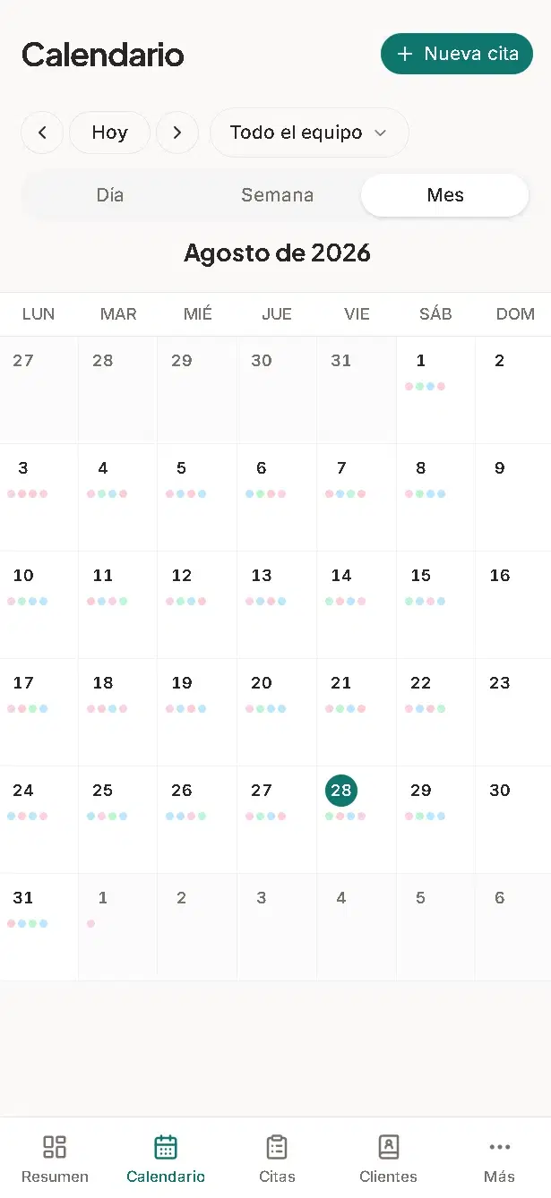 Vista de mes del calendario de AgendaLibre en un teléfono, con los días marcados